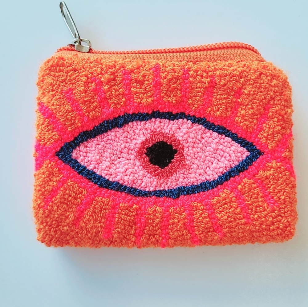 Orange woven coin baggie